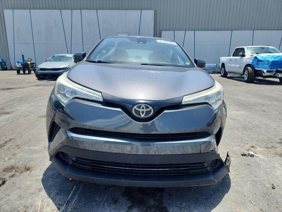 2018 Toyota C-hr VIN NMTKHMBX0JR043544 COPART salvage auction — SIDE, Fl - Cert Of Title Slvg Rebuildable, sold $15 on 2026-07-29 (photo 5)