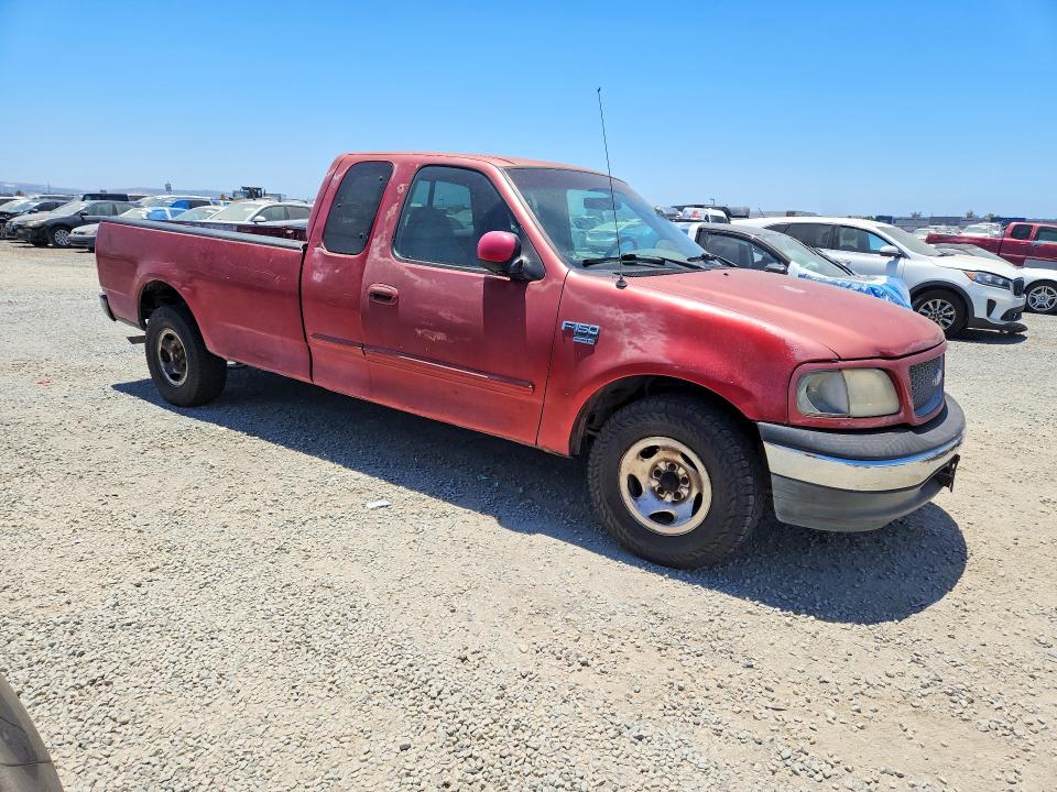 1999 Ford F-150 lightning VIN 1FTRX17L6XKA54166 COPART salvage auction — FRONT END, CA - DLR/DIS/EXP ONLY SALVAGE TITLE, sold $250 on 2026-08-21 (photo 4)