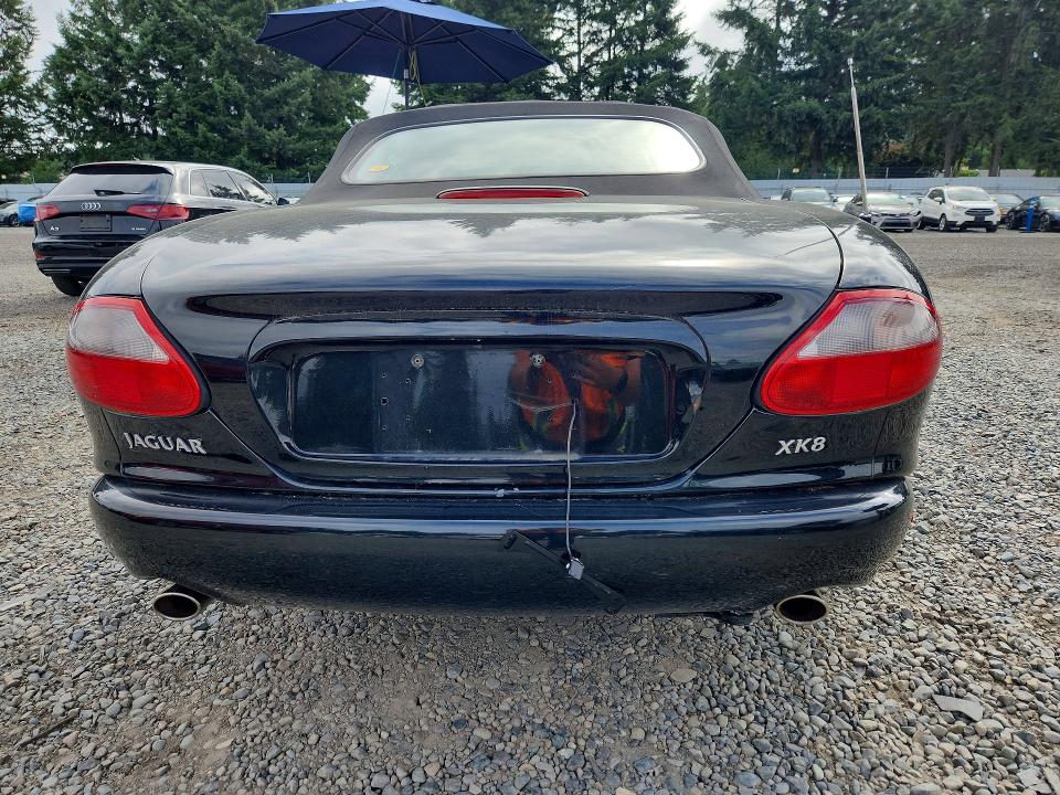 2000 Jaguar Xk series VIN SAJJA42CXYNA03622 COPART salvage auction — MINOR DENT/SCRATCHES, Wa - Cert Of Ownership-Rebuilt, sold $275 on 2026-07-21 (photo 6)