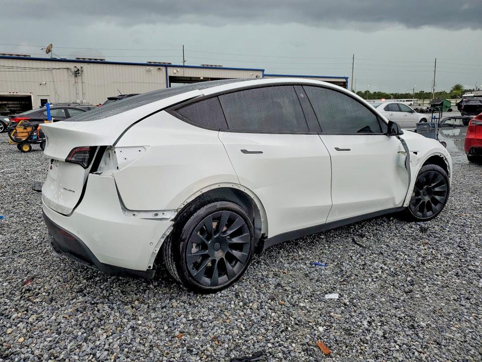 2022 Tesla Model y VIN 7SAYGDEEXNA017150 COPART salvage auction — ALL OVER, FL - CERT OF TITLE SLVG REBUILDABLE, sold $5,500 on 2026-07-24 (photo 3)
