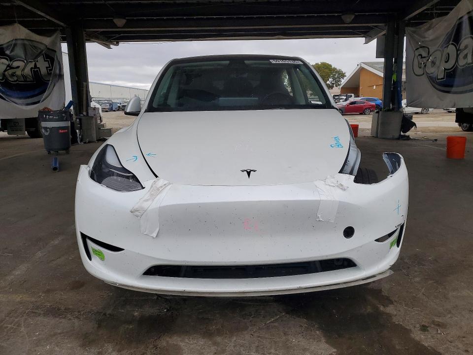 2023 Tesla Model y VIN 7SAYGDEEXPF742575 COPART salvage auction — FRONT END, CA - SALVAGE CERTIFICATE, sold $6,400 on 2026-07-16 (photo 5)