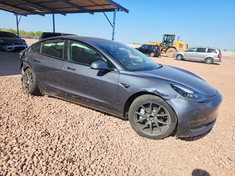 2023 Tesla Model 3 VIN 5YJ3E1EA3PF671809 COPART salvage auction — REAR END, AZ - CERT OF TITLE - SALVAGE, sold $4,450 on 2026-07-23 (photo 4)