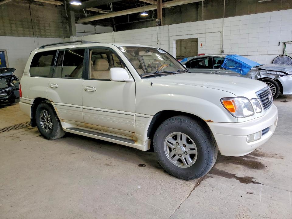 2002 Lexus Lx 470 VIN JTJHT00W623522919 COPART salvage auction — HAIL, MN - CERTIFICATE OF TITLE, sold $1,600 on 2026-07-28 (photo 4)