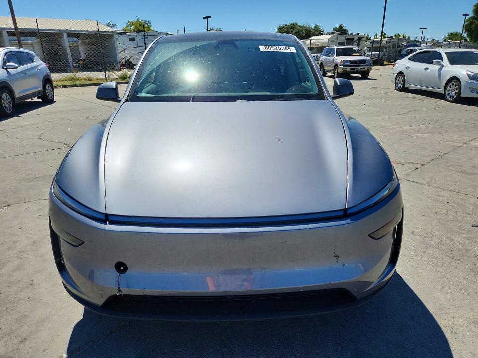 2026 Tesla Model y VIN 7SAYGDED9TF521728 COPART salvage auction — SIDE, Ca - Salvage Certificate, sold $17,900 on 2026-08-31 (photo 5)