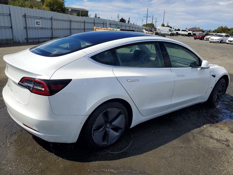 2018 Tesla Model 3 VIN 5YJ3E1EA1JF013218 COPART salvage auction — MINOR DENT/SCRATCHES, Ca - Certificate Of Title, sold $17,007 on 2026-09-01 (photo 3)