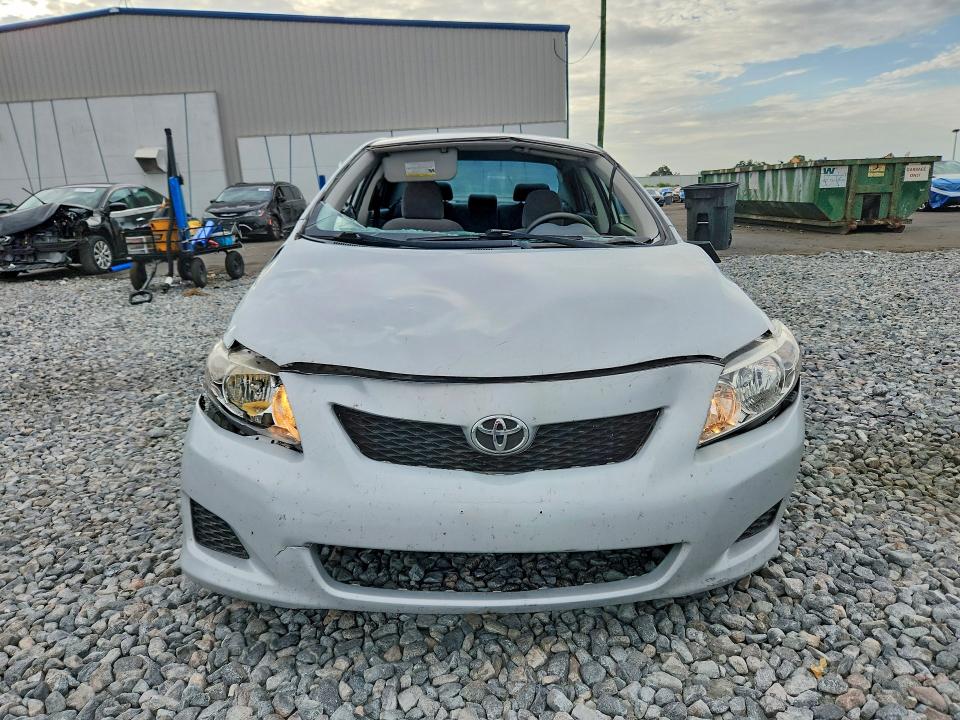 2009 Toyota Corolla VIN JTDBL40E199082946 COPART salvage auction — FRONT END, Fl - Cert Of Title Slvg Rebuildable, sold $275 on 2026-07-22 (photo 5)