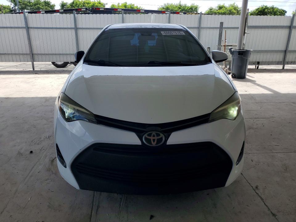 2017 Toyota Corolla VIN 5YFBURHE5HP593387 COPART salvage auction — MINOR DENT/SCRATCHES, Fl - Certificate Of Title, sold $3,900 on 2026-08-01 (photo 5)