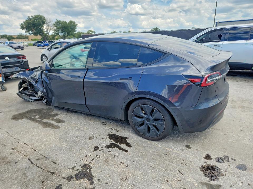 2024 Tesla Model y VIN 7SAYGDED5RF161043 COPART salvage auction — UNDERCARRIAGE, Fl - Certificate Of Title, sold $9,700 on 2026-07-21 (photo 2)