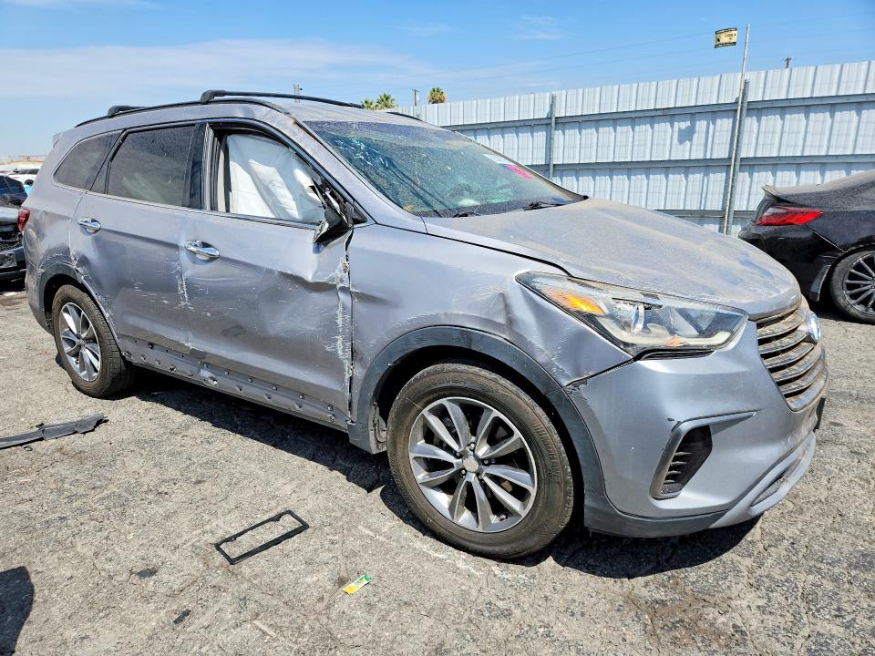 2019 Hyundai Santa fe VIN KM8SM4HFXKU307244 COPART salvage auction — ROLLOVER, Ca - Dis/Dlr/Exp Only Clean Title, sold $450 on 2026-07-30 (photo 4)