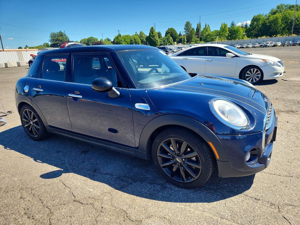 2015 Mini Cooper VIN WMWXU3C55F2B57127 COPART salvage auction — FRONT END, OR - SALVAGE TITLE CERTIFICATE, sold $1,050 on 2026-08-31 (photo 4)