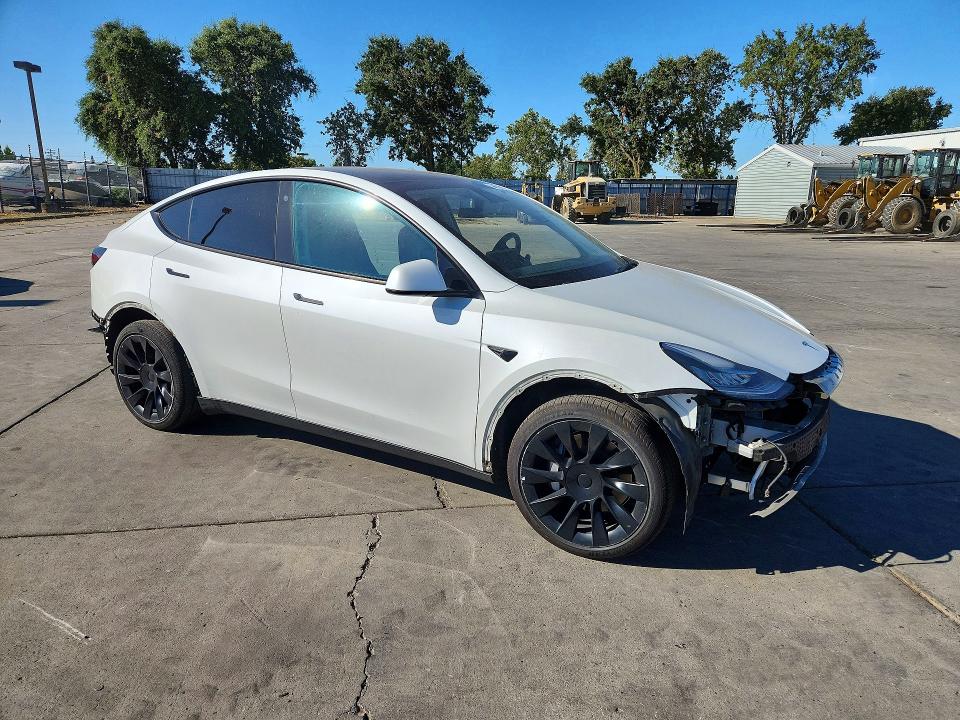 2021 Tesla Model y VIN 5YJYGDEE1MF244919 COPART salvage auction — SIDE, Ca - Salvage Certificate, sold $8,700 on 2026-08-31 (photo 4)