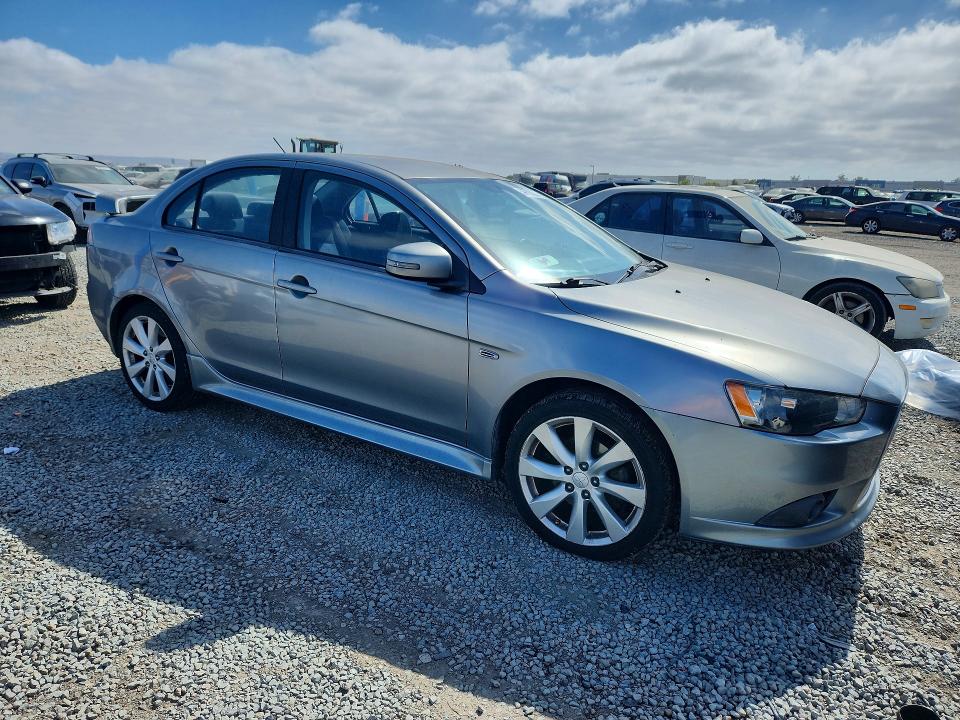2015 Mitsubishi Lancer VIN JA32U8FW9FU026510 COPART salvage auction — MINOR DENT/SCRATCHES, Ca - Dis/Dlr/Exp Only Clean Title, sold $425 on 2026-07-07 (photo 4)