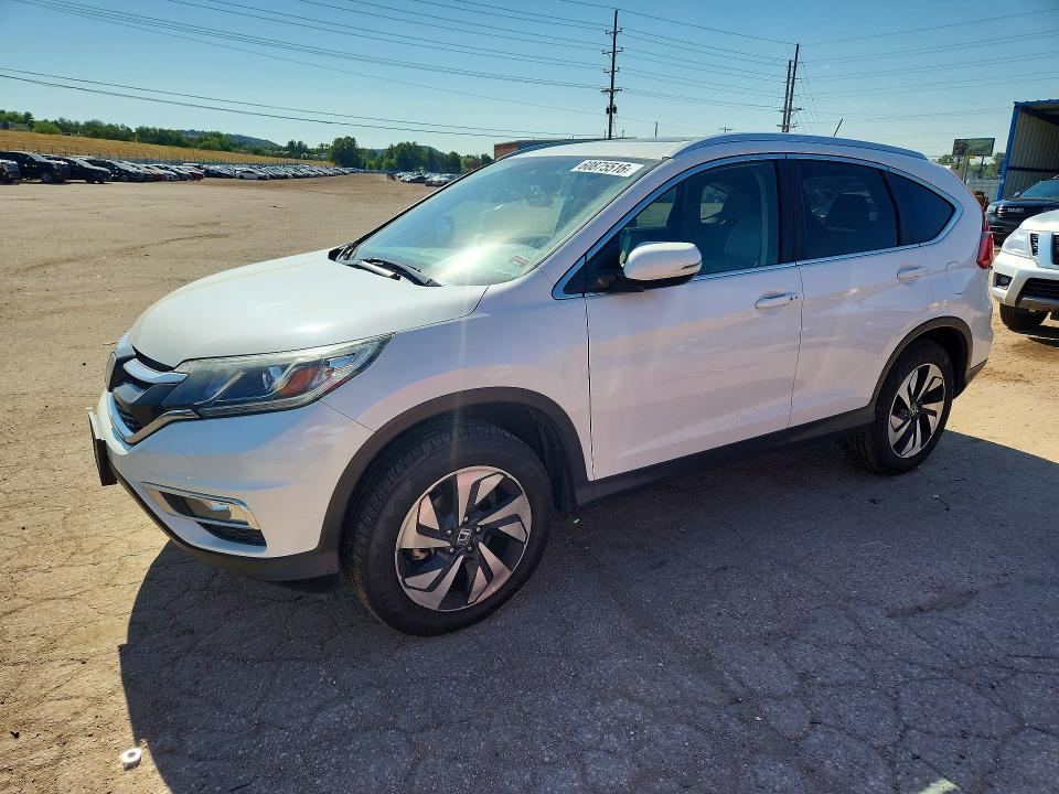 2015 Honda Cr-v VIN 5J6RM4H9XFL070029 COPART salvage auction — HAIL, Co - Certificate Of Title, sold $9,400 on 2026-08-19 (photo 1)