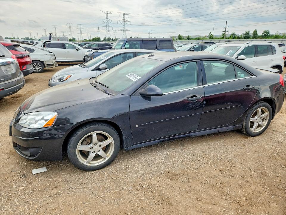 2009 Pontiac G6 VIN 1G2ZJ57K194254772 COPART salvage auction — WATER/FLOOD, Wv - Salvage Cert - Flood Damaged, sold $300 on 2026-08-20 (photo 1)