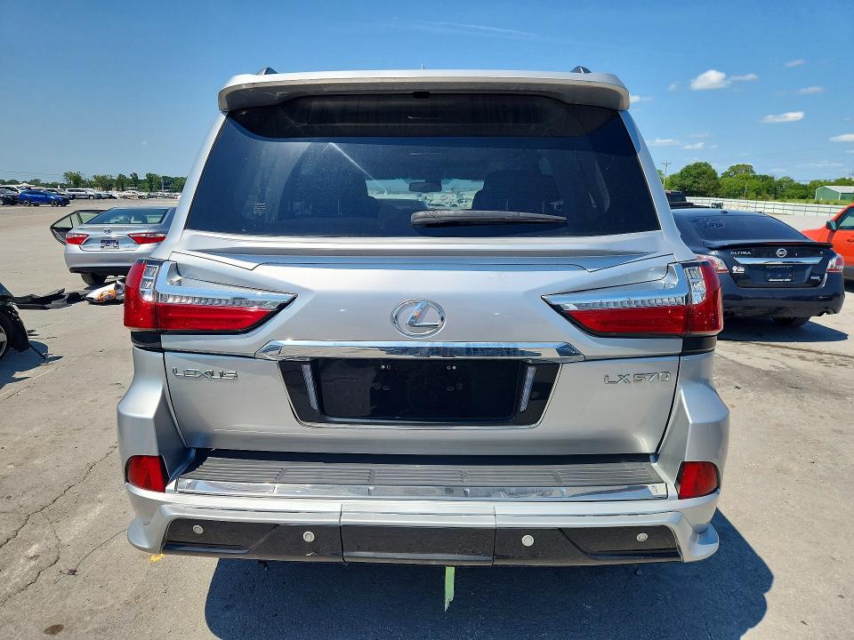 2010 Lexus Lx 570 VIN JTJHY7AX5A4037066 COPART salvage auction — MINOR DENT/SCRATCHES, Ar - Certificate Of Title, sold $7,600 on 2026-07-27 (photo 6)