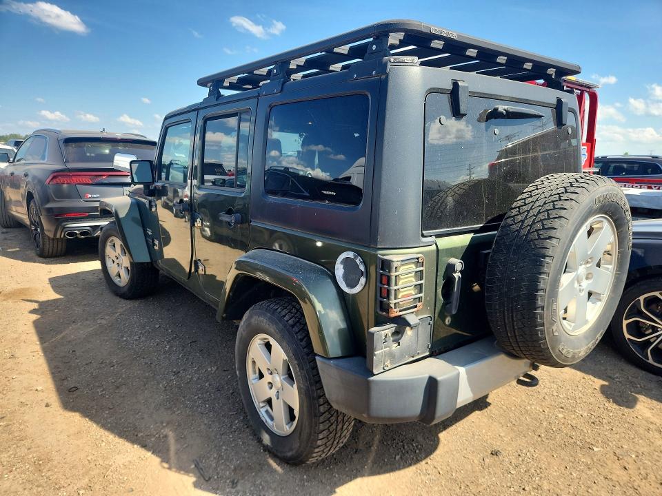 2008 Jeep Wrangler unlimited VIN 1J4GA59198L520500 COPART salvage auction — NORMAL WEAR, IN - CERTIFICATE OF TITLE, sold $2,472 on 2026-07-09 (photo 2)