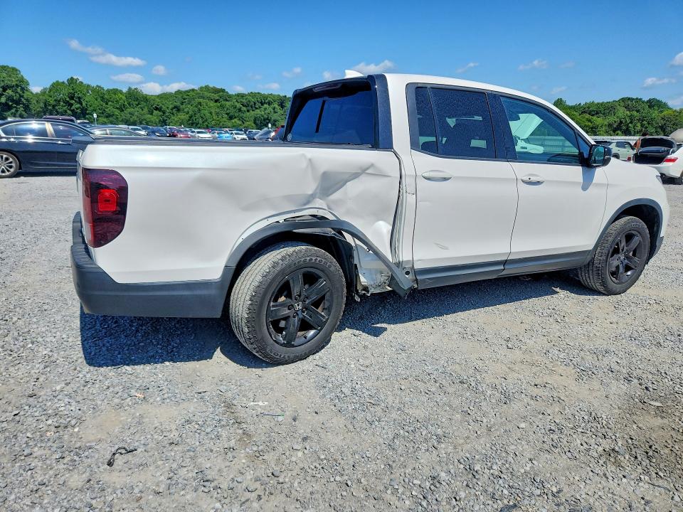 2023 Honda Ridgeline VIN 5FPYK3F86PB006559 COPART salvage auction — SIDE, Nc - Salvage Certificate Of Title, sold $16,600 on 2026-08-19 (photo 3)