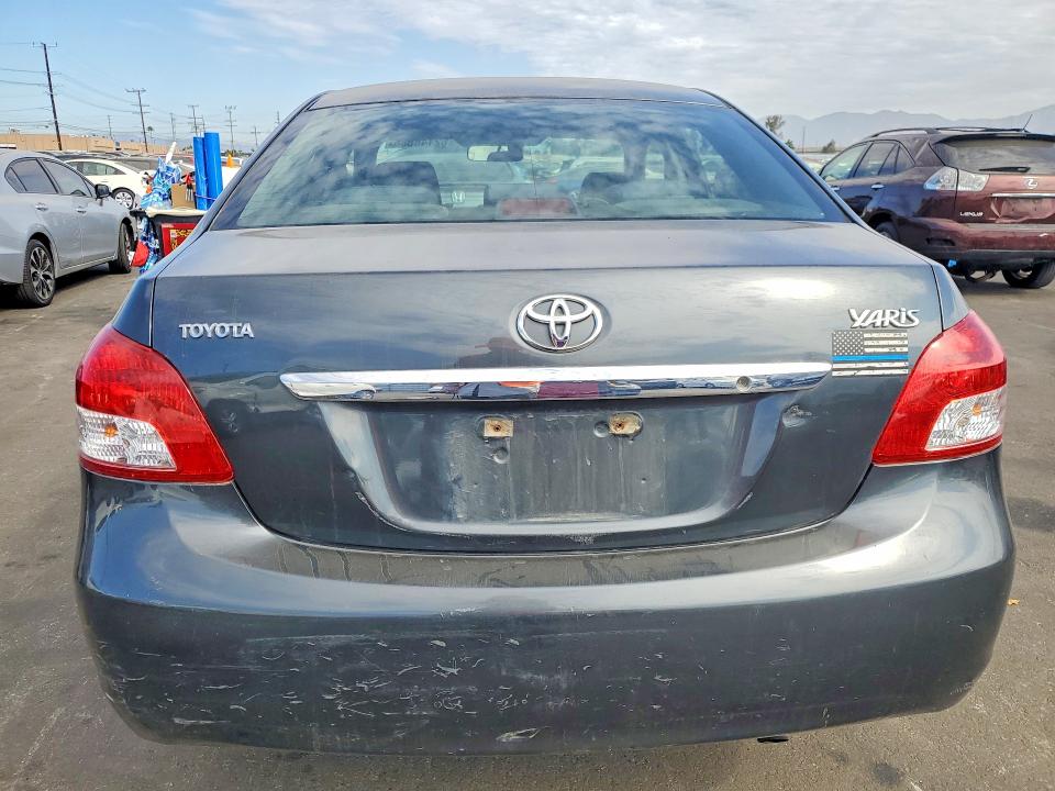 2010 Toyota Yaris VIN JTDBT4K32A4069118 COPART salvage auction — MINOR DENT/SCRATCHES, Ca - Acq Bos - Post Sale - Salvage, sold $225 on 2026-07-27 (photo 6)
