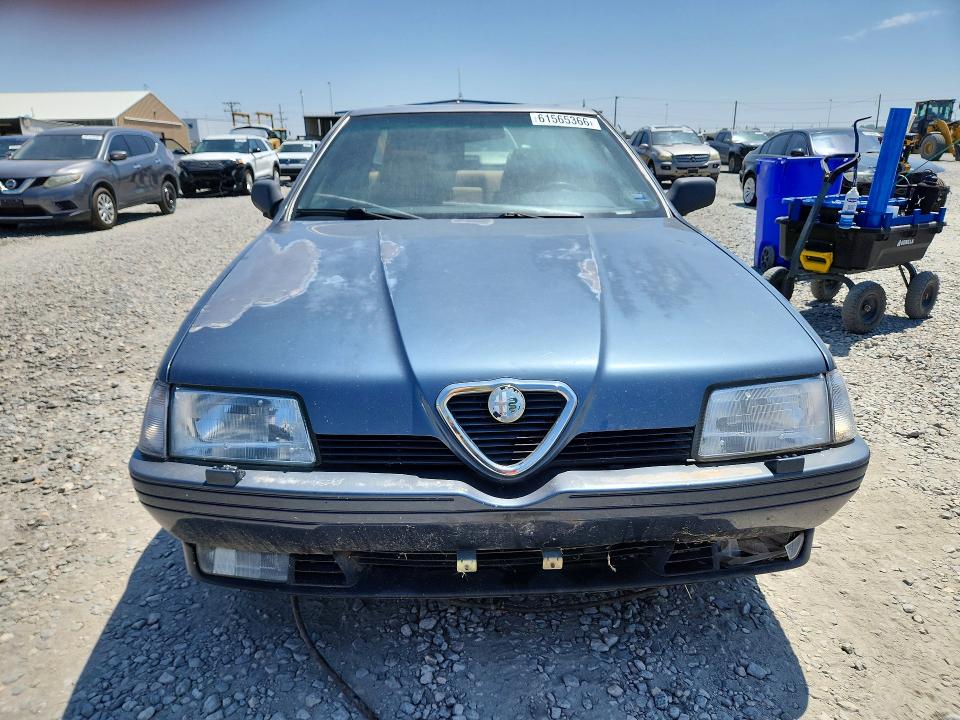 1991 Alfa romeo 164 VIN ZAREA43L5M6186854 COPART salvage auction — FRONT END, CO - DIS/DLR/EXP ONLY CLEAN TITLE, sold $275 on 2026-08-06 (photo 5)