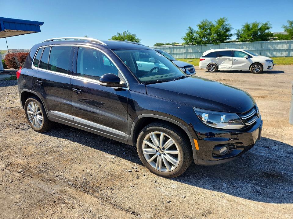 2012 Volkswagen Tiguan VIN WVGAV7AX4CW532388 COPART salvage auction — MINOR DENT/SCRATCHES, Wi - Certificate Of Title, sold $200 on 2026-07-21 (photo 4)