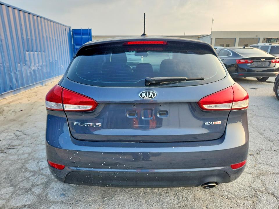 2015 Kia Forte VIN KNAFX5A83F5295031 COPART salvage auction — NORMAL WEAR, In - Certificate Of Title, sold $500 on 2026-07-31 (photo 6)