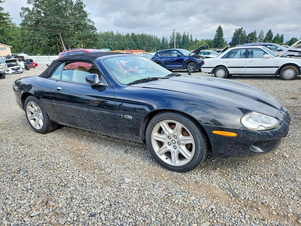 2000 Jaguar Xk series VIN SAJJA42CXYNA03622 COPART salvage auction — MINOR DENT/SCRATCHES, Wa - Cert Of Ownership-Rebuilt, sold $275 on 2026-07-21 (photo 4)