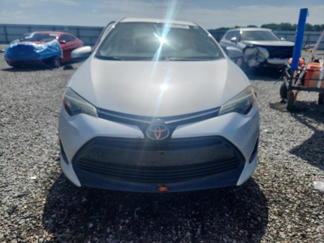 2017 Toyota Corolla VIN 5YFBURHE3HP671827 COPART salvage auction — SIDE, Fl - Cert Of Title Slvg Rebuildable, sold $375 on 2026-07-28 (photo 5)