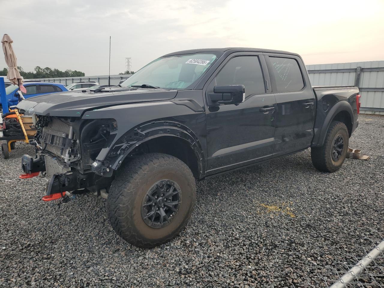 2023 Ford F-150 Lightning VIN 1FTFW1RJXPFC92967 — COPART salvage auction photo