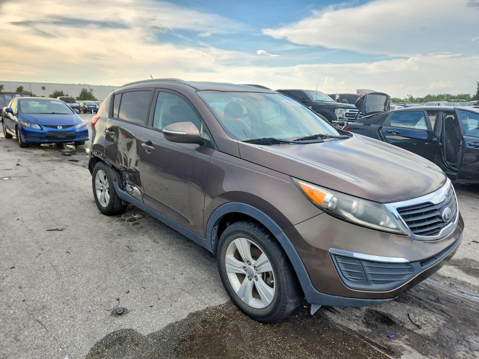 2013 Kia Sportage VIN KNDPB3A27D7480707 COPART salvage auction — SIDE, Fl - Certificate Of Title, sold $1,550 on 2026-07-21 (photo 4)