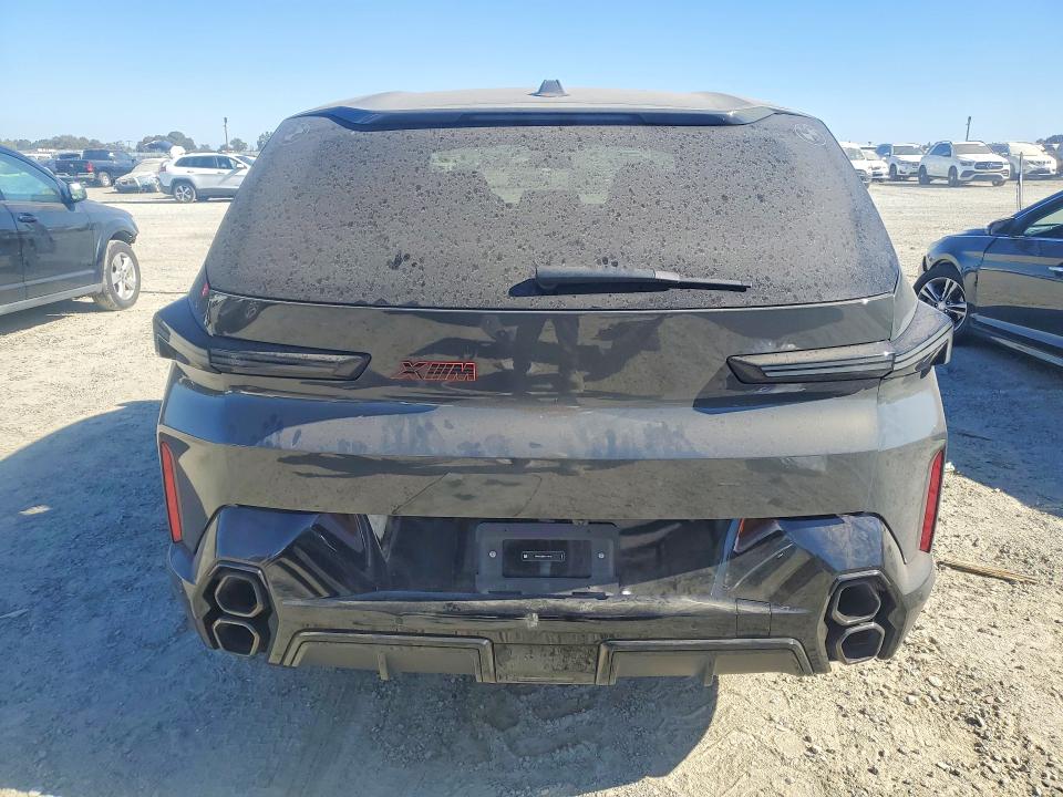 2026 BMW Xm VIN 5YM33CS02T9170192 COPART salvage auction — SIDE, CA - SALVAGE CERTIFICATE, sold $77,000 on 2026-08-25 (photo 6)