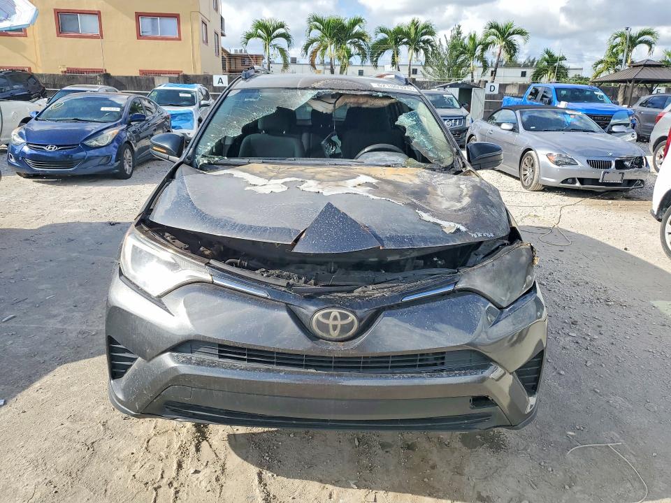 2017 Toyota Rav4 VIN JTMZFREV8HJ700272 COPART salvage auction — BURN, FL - CERT OF TITLE SLVG REBUILDABLE, sold $1,600 on 2026-07-31 (photo 5)