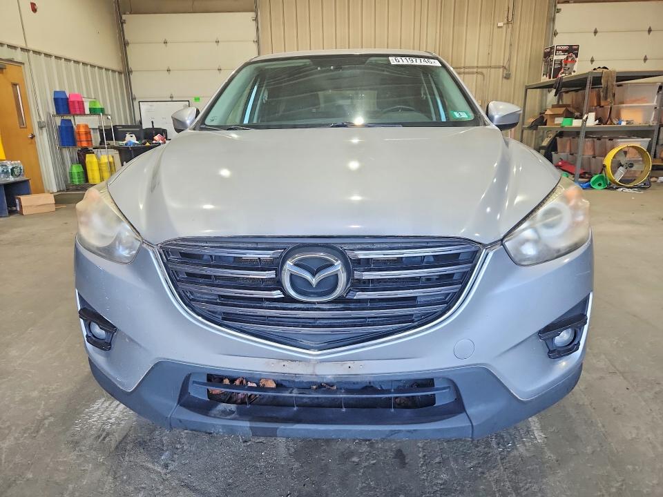 2016 Mazda Cx-5 VIN JM3KE4CY4G0606728 COPART salvage auction — REAR END, NH - CERTIFICATE OF TITLE, sold $100 on 2026-07-28 (photo 5)