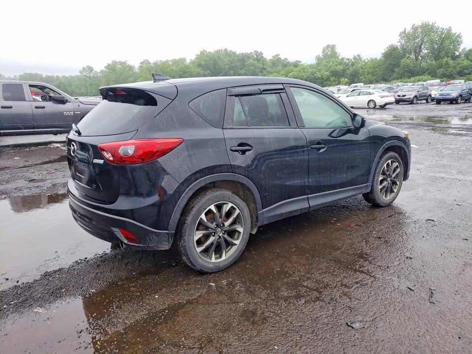 2016 Mazda VIN JM3KE4DY5G0909760 COPART salvage auction — SIDE, CT - CERT OF TITLE-SALVAGE, sold $3,550 on 2026-07-10 (photo 3)