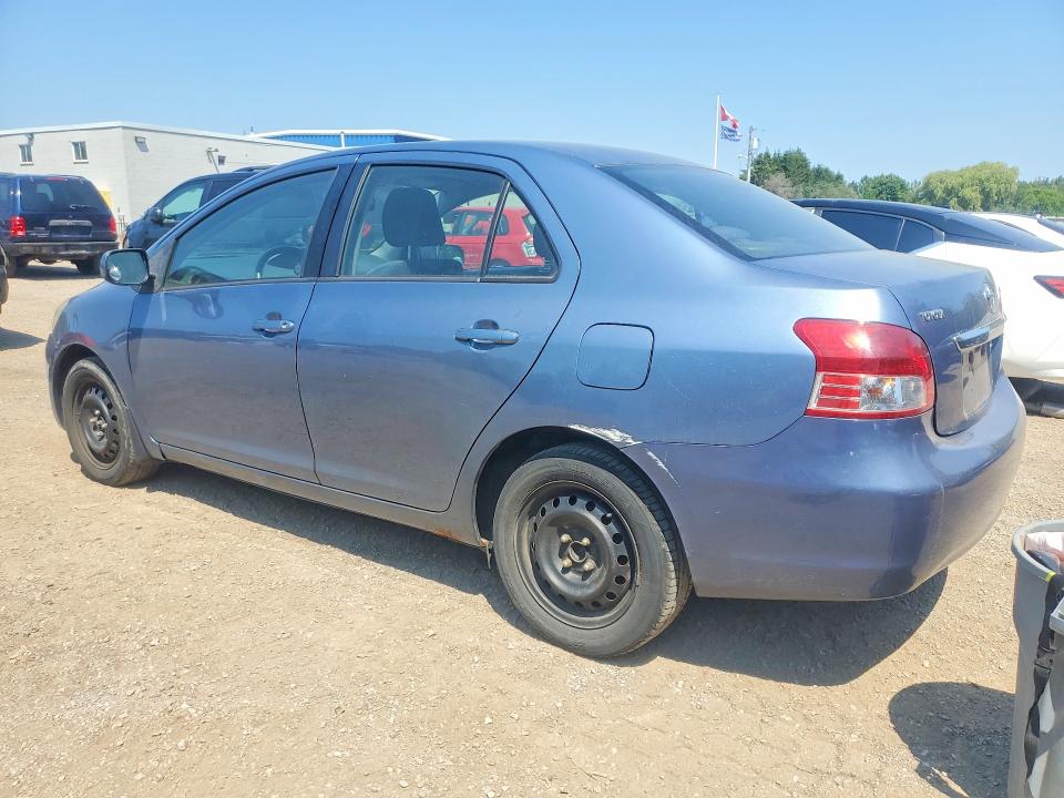2009 Toyota Yaris VIN JTDBT923491310123 COPART salvage auction — SIDE, On - Permit Salvage, sold $350 on 2026-07-28 (photo 2)