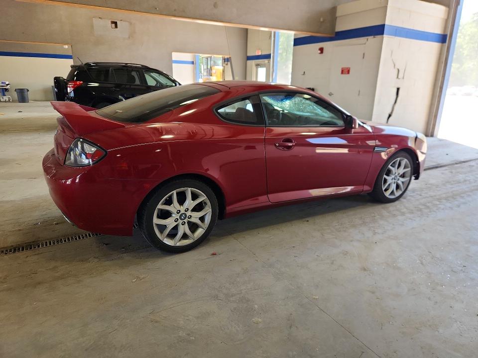 2007 Hyundai Tiburon VIN KMHHN66F57U253137 COPART salvage auction — ROOF, Va - Cert Of Title - Salvage, sold $425 on 2026-07-31 (photo 3)
