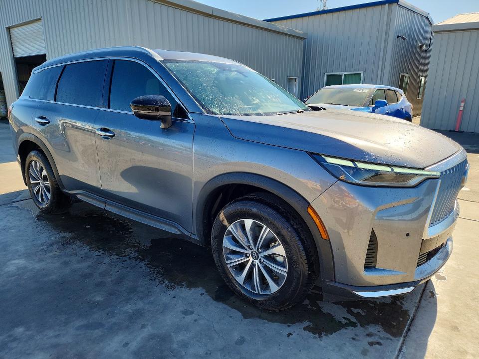 2025 Infiniti Qx60 VIN 5N1AL1FRXSC345072 COPART salvage auction — MINOR DENT/SCRATCHES, Tx - Dis/Dlr/Exp Only Clean Title (P), sold $8,500 on 2026-07-23 (photo 4)