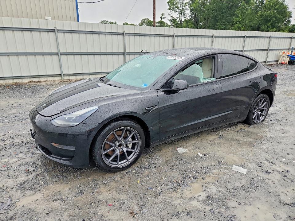 2021 Tesla Model 3 VIN 5YJ3E1EA2MF915994 — COPART salvage auction photo