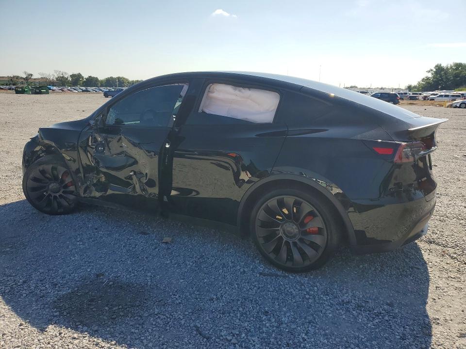 2023 Tesla Model y VIN 7SAYGDEF6PF844075 COPART salvage auction — SIDE, Fl - Cert Of Title Slvg Rebuildable, sold $9,700 on 2026-07-31 (photo 2)