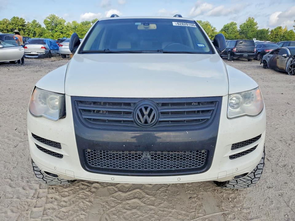 2010 Volkswagen Touareg VIN WVGFK7A93AD000946 COPART salvage auction — SIDE, TX - SALVAGE VEHICLE TITLE (P), sold $1,600 on 2026-08-07 (photo 5)