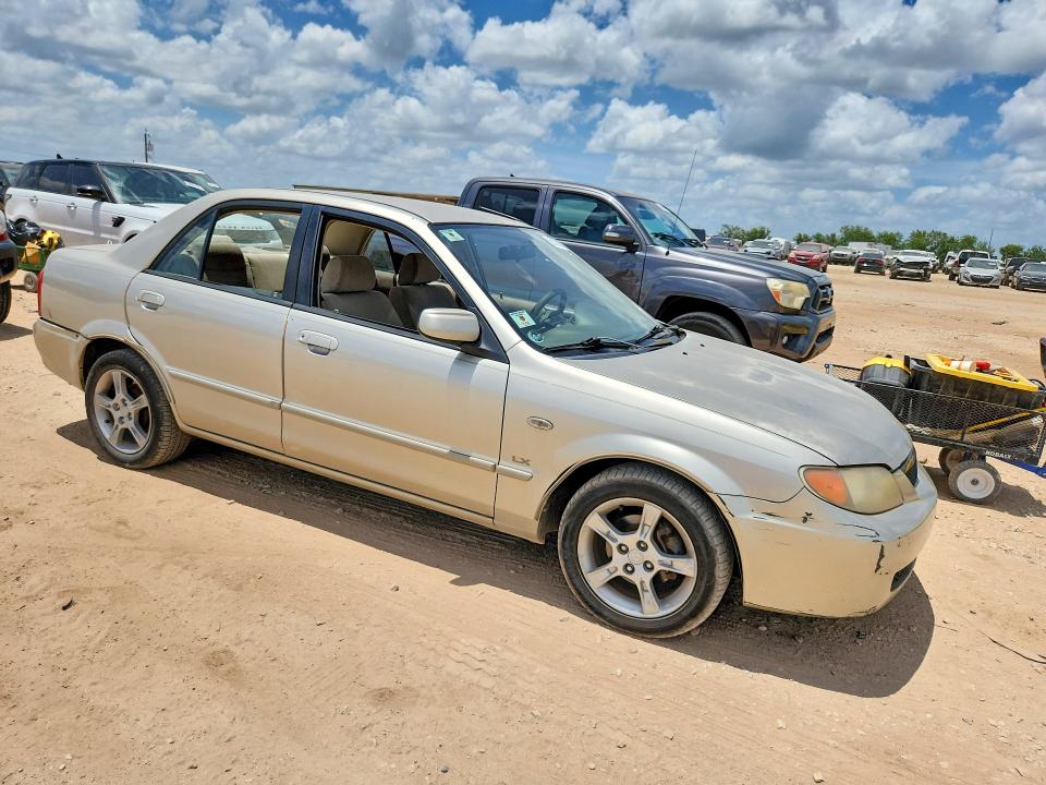 2003 Mazda Protege VIN JM1BJ225731198746 COPART salvage auction — MINOR DENT/SCRATCHES, Tx - Certificate Of Title, sold $450 on 2026-07-09 (photo 4)