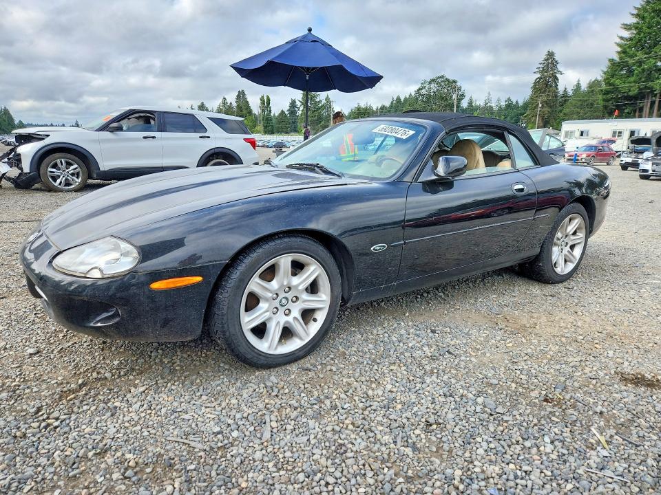 2000 Jaguar Xk series VIN SAJJA42CXYNA03622 COPART salvage auction — MINOR DENT/SCRATCHES, Wa - Cert Of Ownership-Rebuilt, sold $275 on 2026-07-21 (photo 1)