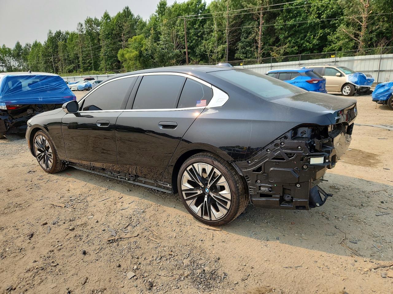 2024 BMW 5 Series VIN WBA53FJ04RCR24223 COPART salvage auction — Rear End, VA - CERT OF TITLE - SALVAGE, sold $29,750 on 2026-08-11 (photo 2)