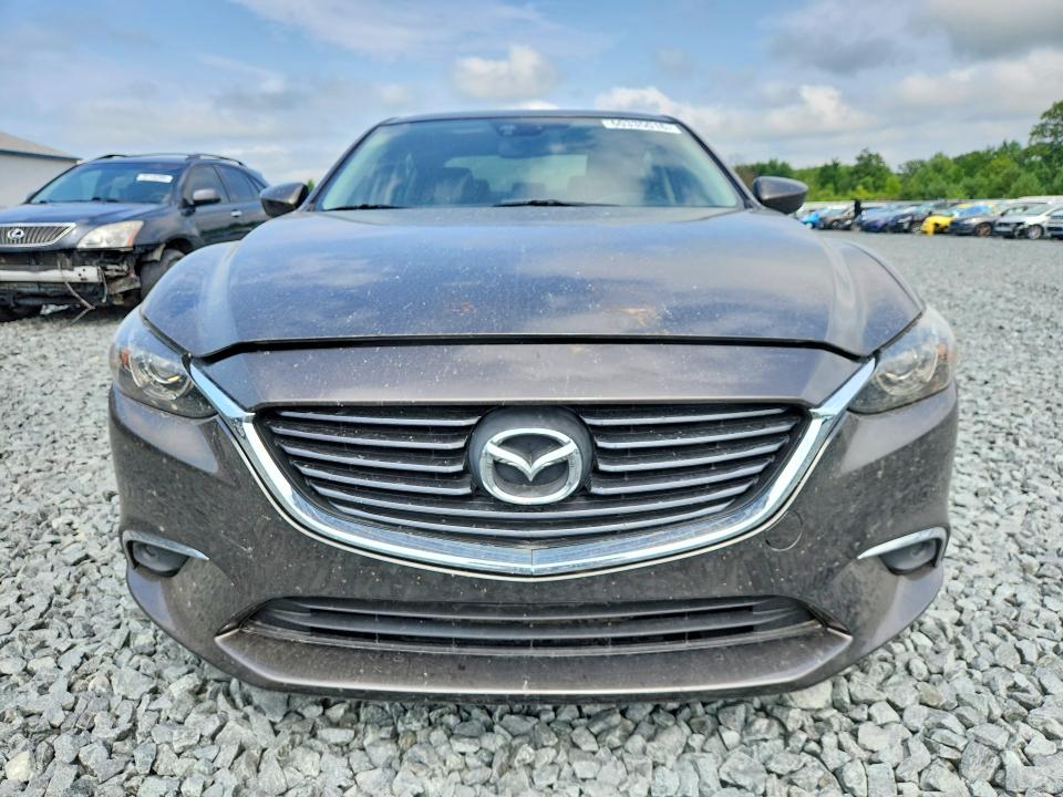 2016 Mazda VIN JM1GJ1W50G1471378 COPART salvage auction — WATER/FLOOD, Oh - Cert Of Title-Salvage Flood, sold $1,700 on 2026-07-27 (photo 5)