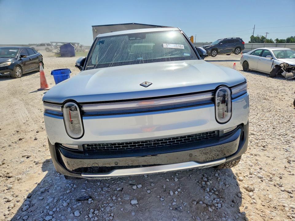 2025 Rivian R1t VIN 7FCTGBAA8SN035090 COPART salvage auction — REAR END, TX - SALVAGE VEHICLE TITLE (P), sold $17,700 on 2026-08-13 (photo 5)