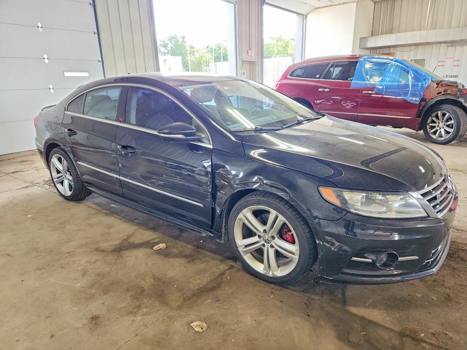 2014 Volkswagen VIN WVWAN7AN3EE528019 COPART salvage auction — FRONT END, WI - JUNKED VEHICLE BILL OF SALE, sold $425 on 2026-08-03 (photo 4)