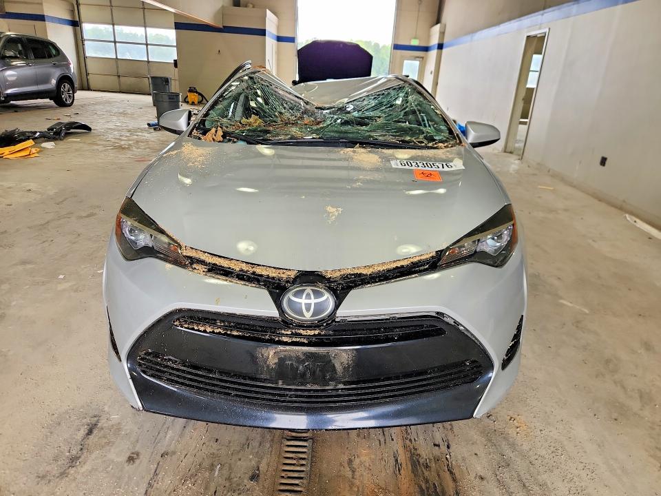 2017 Toyota Corolla VIN 5YFBURHE7HP636711 COPART salvage auction — ALL OVER, VA - CERT OF TITLE - SALVAGE, sold $1,350 on 2026-07-24 (photo 5)