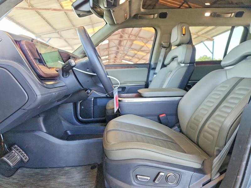 2023 Rivian R1s VIN 7PDSGABA2PN016190 COPART salvage auction — ROLLOVER, GA - CERT OF TITLE-SALVAGE, sold $19,300 on 2026-10-08 (photo 7)