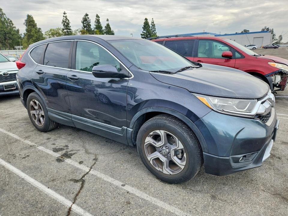 2017 Honda Cr-v VIN 7FARW1H57HE015771 COPART salvage auction — MINOR DENT/SCRATCHES, Ca - Dis/Dlr/Exp Only Clean Title (P), sold $7,400 on 2026-07-30 (photo 4)