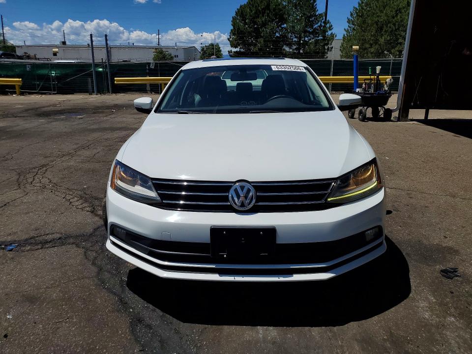 2017 Volkswagen Jetta VIN 3VWL17AJ0HM211313 COPART salvage auction — REAR END, CO - PUBLIC - SALVAGE TITLE (P), sold $2,100 on 2026-08-04 (photo 5)