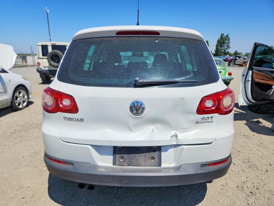 2011 Volkswagen Tiguan VIN WVGBV7AX5BW516171 COPART salvage auction — REAR END, OR - CERTIFICATE OF TITLE, sold $200 on 2026-08-04 (photo 6)